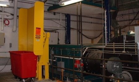 Medical waste incinerator with cart tipper